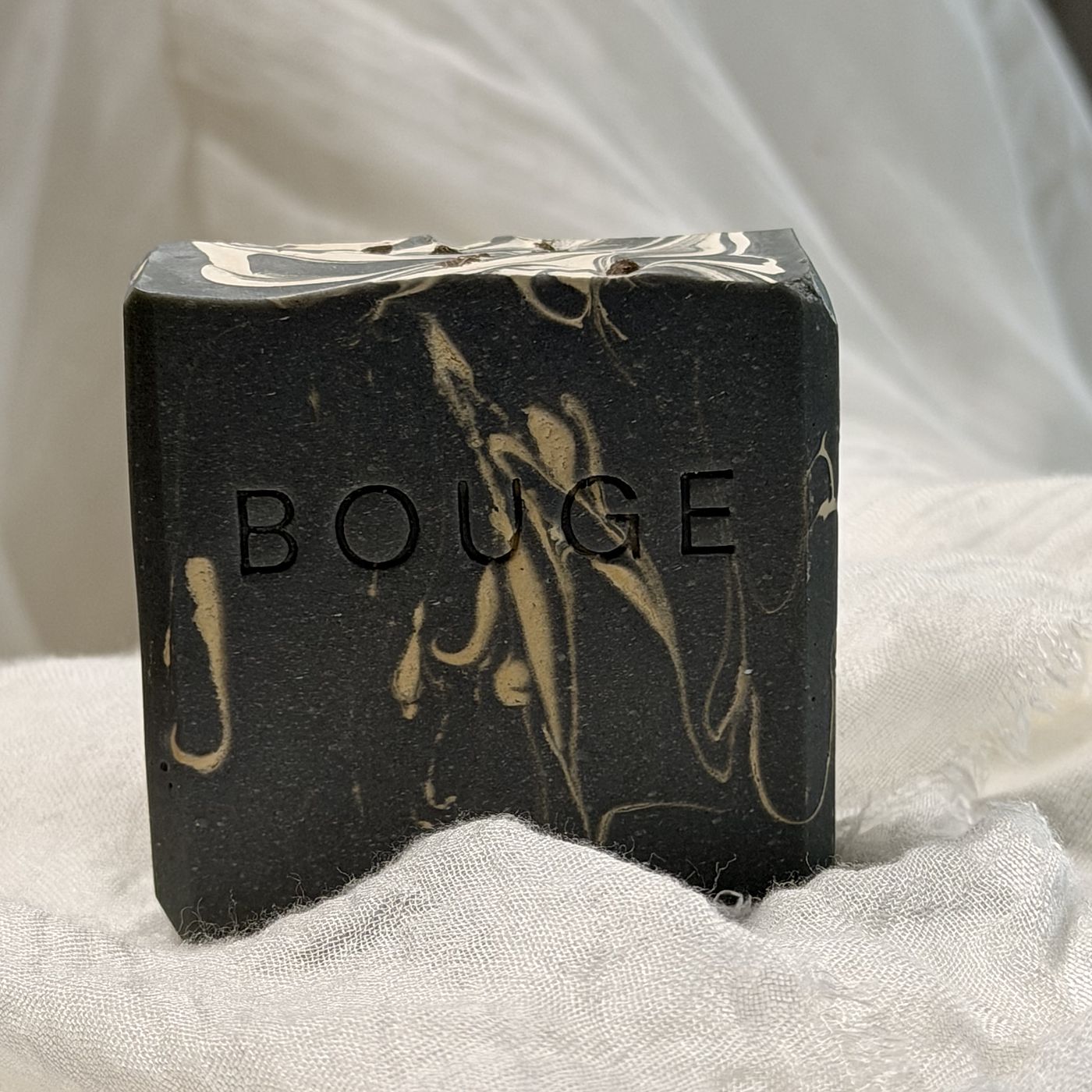 BOUGE Atelier No.01 soap, charcoal bar with gold and cream swirls