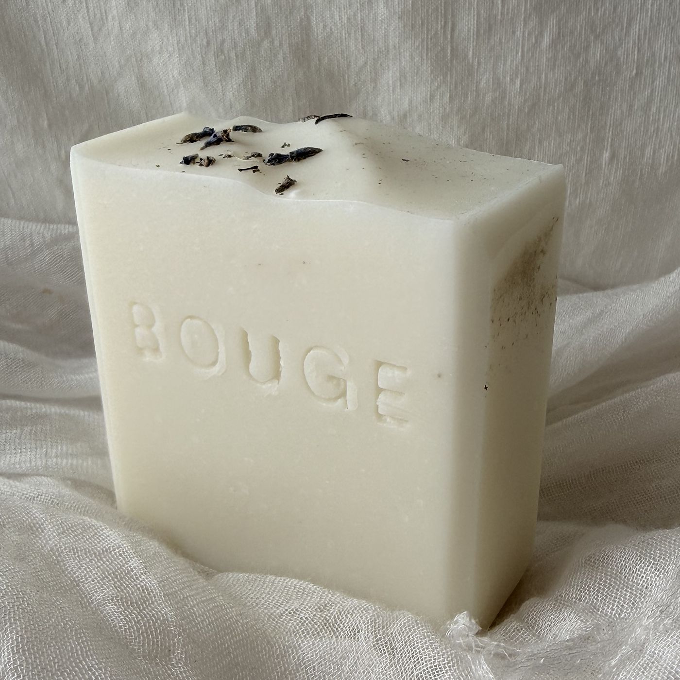 BOUGE Atelier No.08 soap, ivory bar topped with dried botanicals